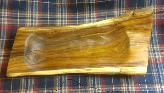 Electrifed Wood Artisan bringing you hand carved wooden spoons, dough bowls,custom wood work and unique keepsakes and gifts seared with lictenberg burns of beautiful distinction.